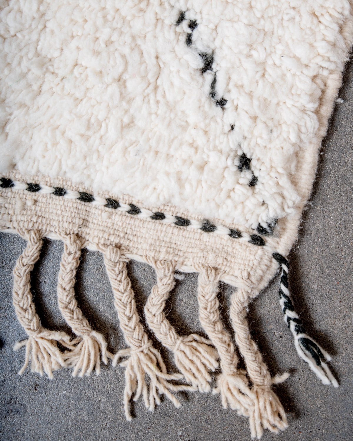 Modern, designer, handcrafted Berber rug from Morocco. Beniourain carpet with minimalist design, natural wool pile and a fluffy texture.