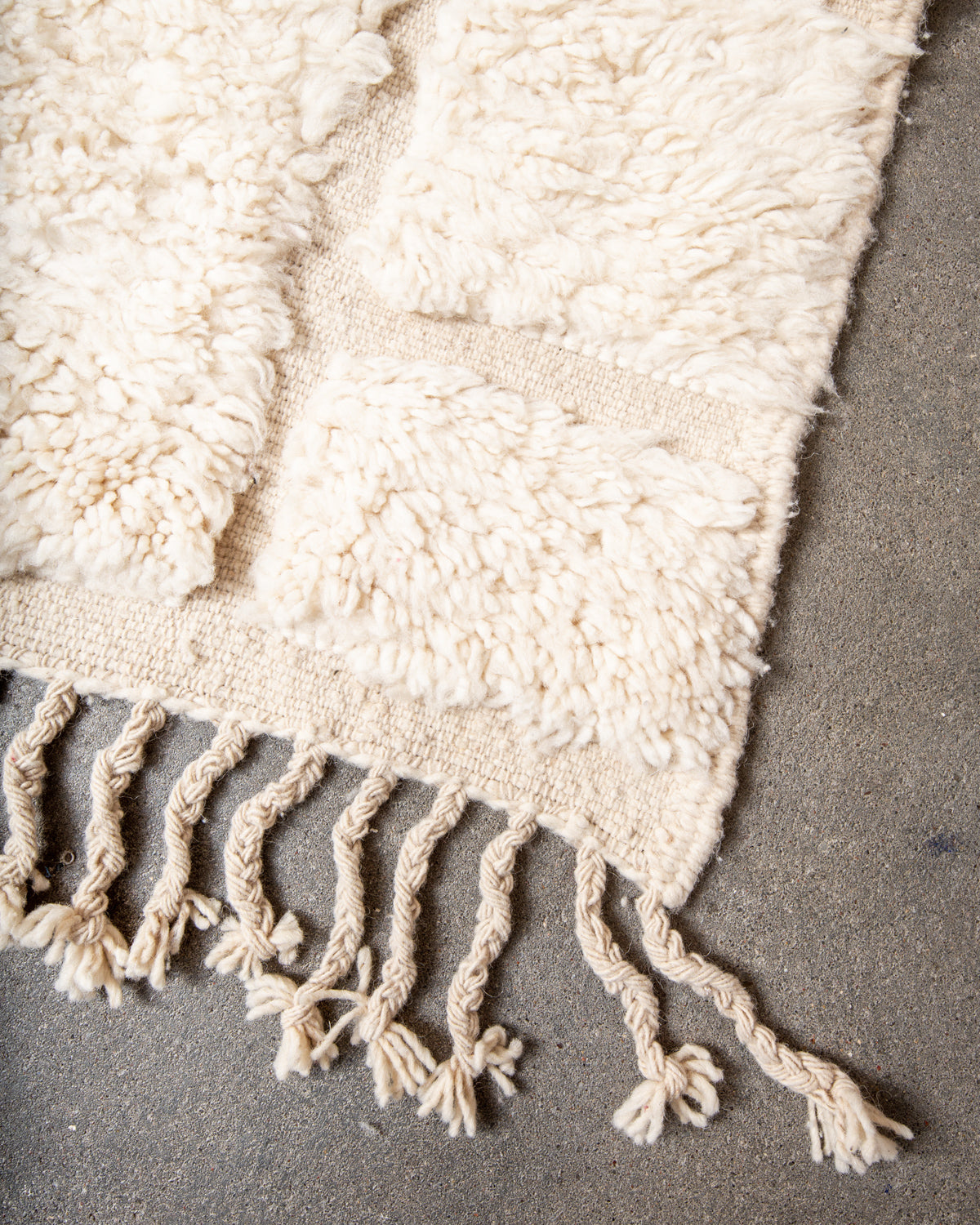 Modern, designer, handcrafted Berber rug from Morocco. Beniourain carpet with minimalist design, natural wool pile and a fluffy texture.