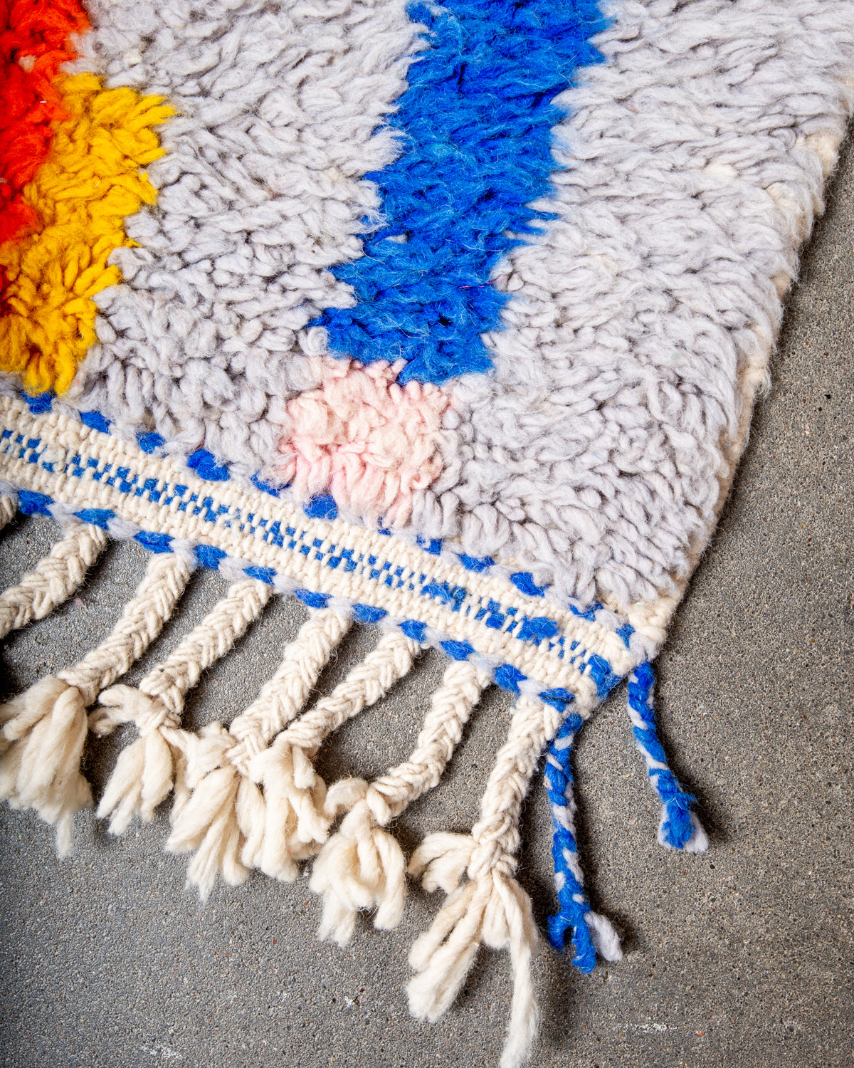 Modern, designer, handcrafted Berber rug from Morocco. Beniourain carpet with beautiful colours and patterns and fluffy wool texture.