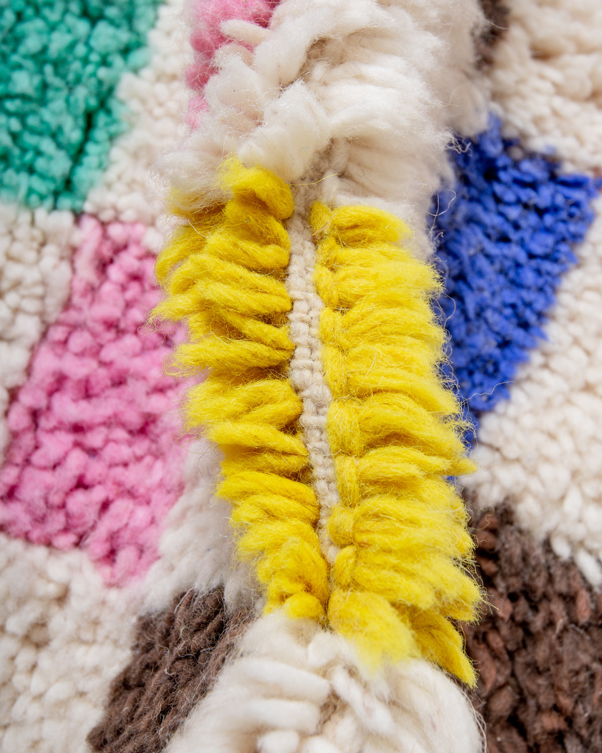 Modern, designer, handcrafted Berber rug from Morocco. Beniourain carpet with beautiful colours and patterns and fluffy wool texture.