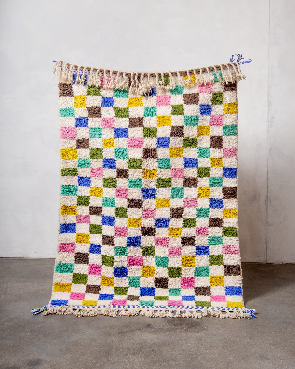 Modern, designer, handcrafted Berber rug from Morocco. Beniourain carpet with beautiful colours and patterns and fluffy wool texture.