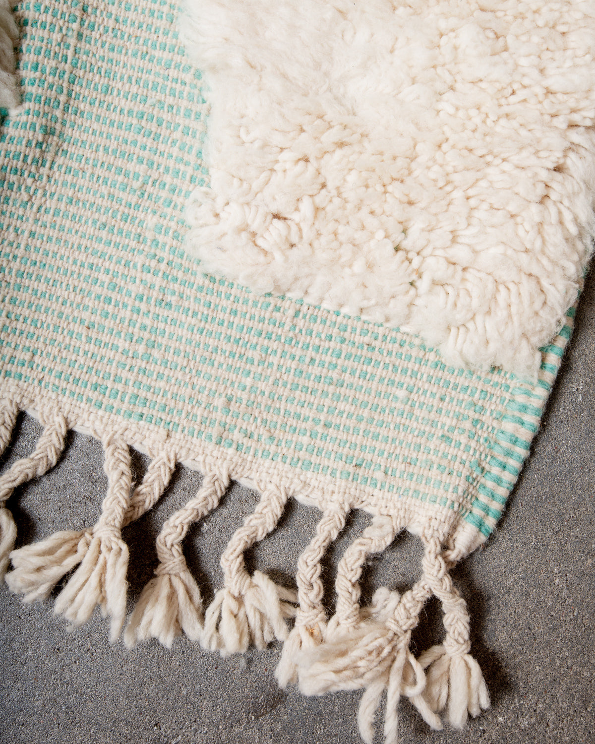Modern, designer, handcrafted Berber rug from Morocco. Beniourain carpet with minimalist design, natural wool pile and a fluffy texture.