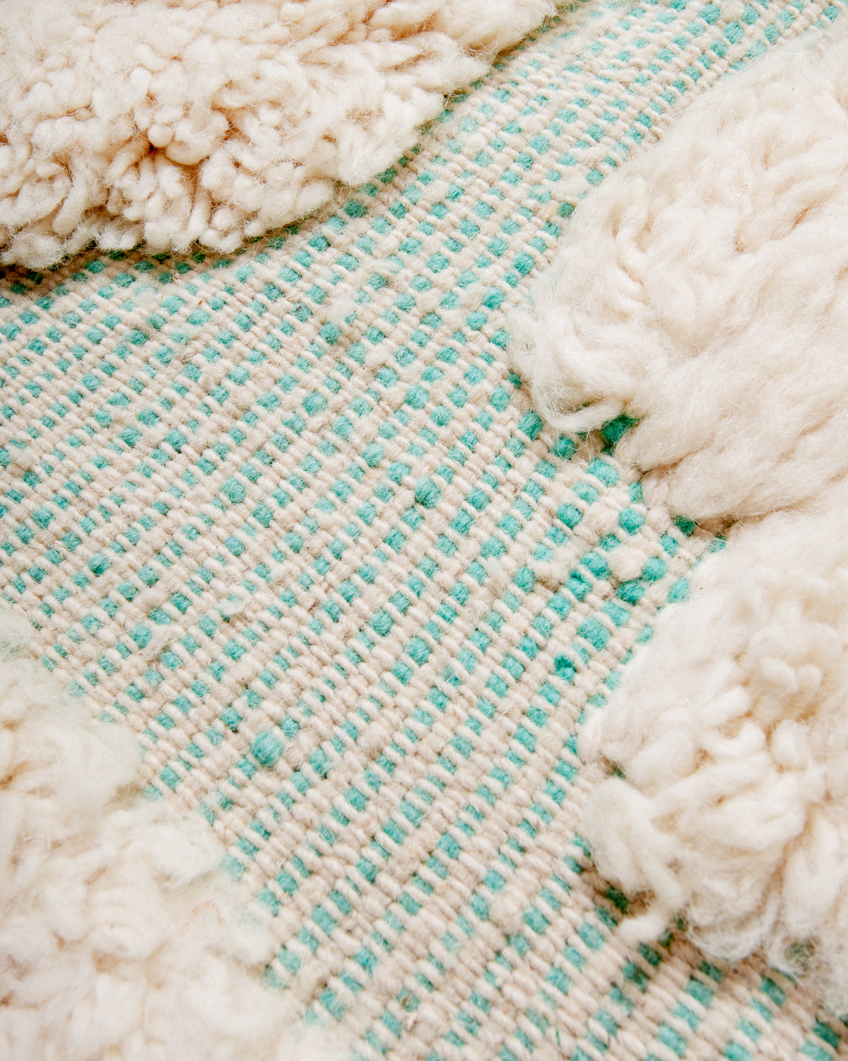 Modern, designer, handcrafted Berber rug from Morocco. Beniourain carpet with minimalist design, natural wool pile and a fluffy texture.