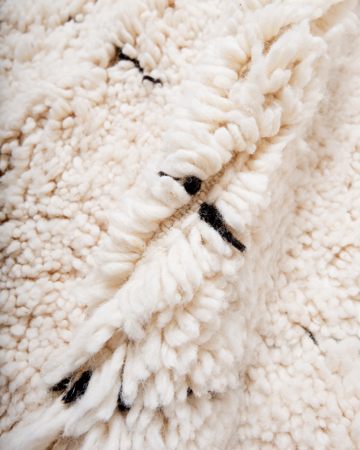 Modern, designer, handcrafted Berber rug from Morocco. Beniourain carpet with minimalist design, natural wool pile and a fluffy texture.