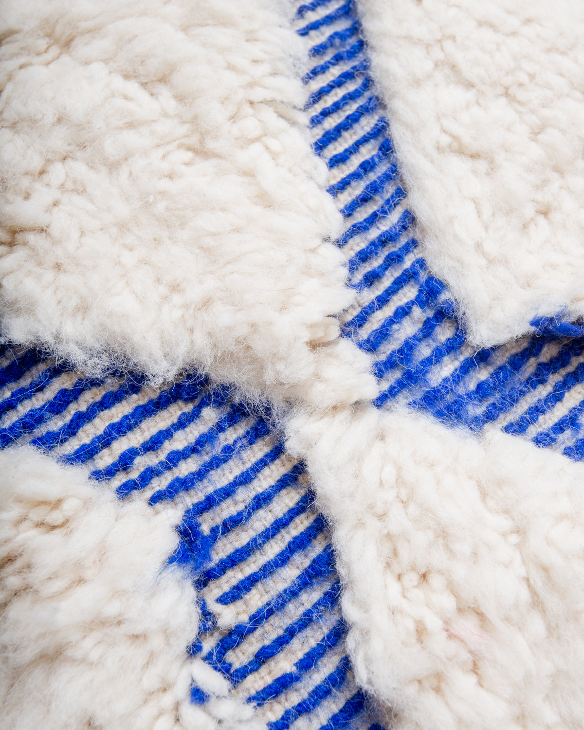 Modern, designer, handcrafted Berber rug from Morocco. Beniourain carpet with beautiful colours and patterns and fluffy wool texture. 