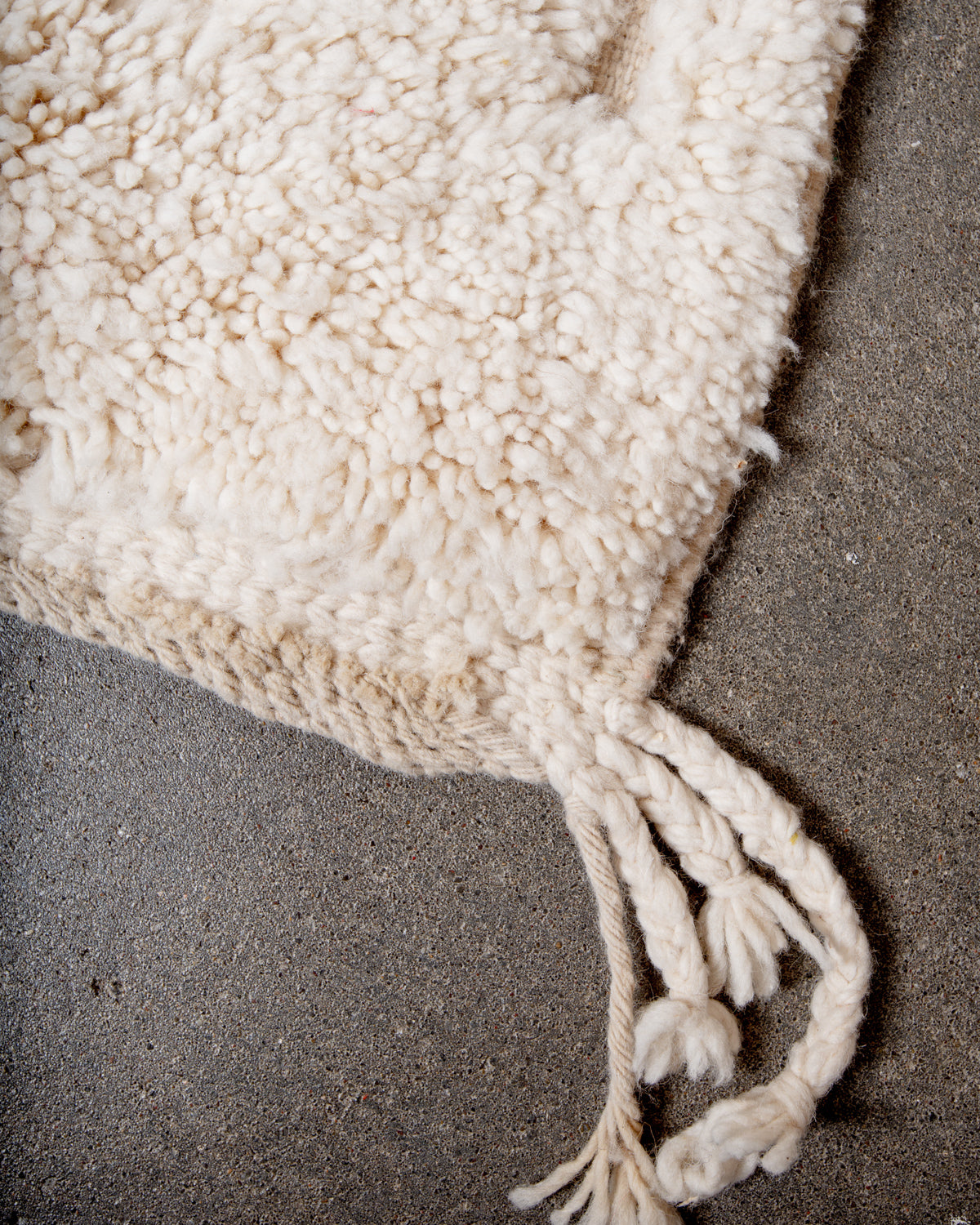 Modern, designer, handcrafted Berber rug from Morocco. Beniourain carpet with minimalist design, natural wool pile and a fluffy texture.
