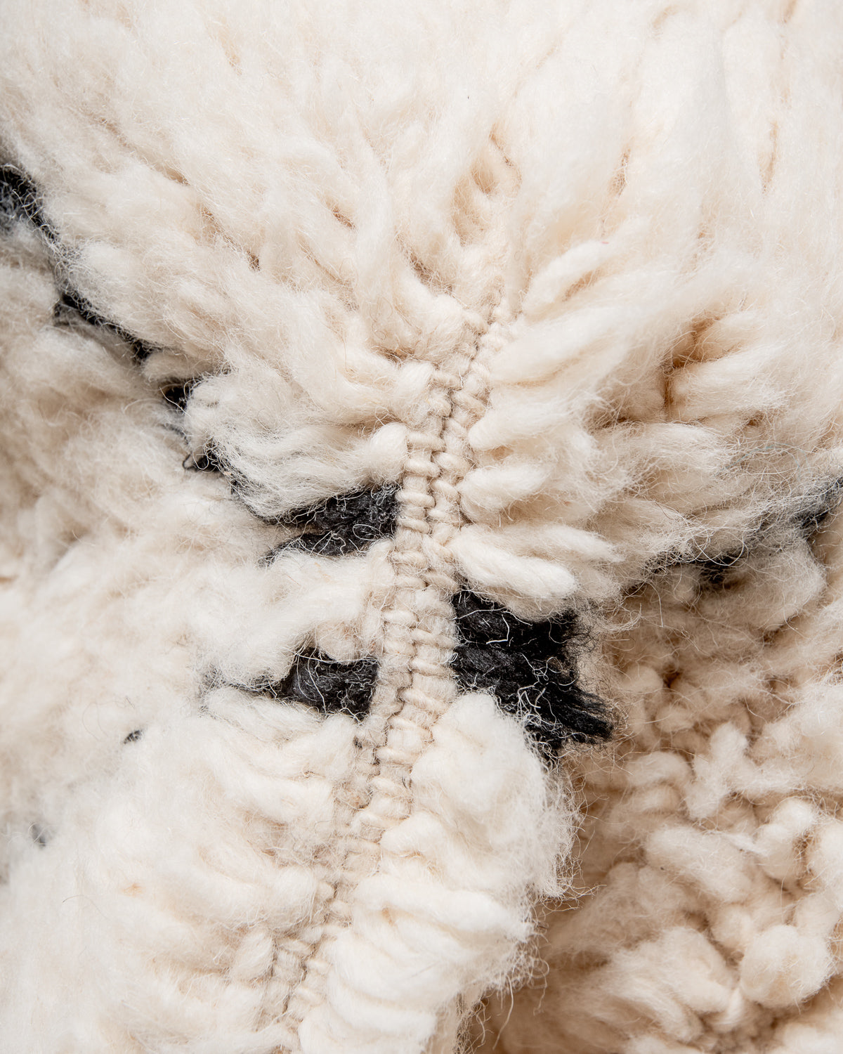 Modern, designer, handcrafted Berber rug from Morocco. Beniourain carpet with minimalist design, natural wool pile and a fluffy texture.