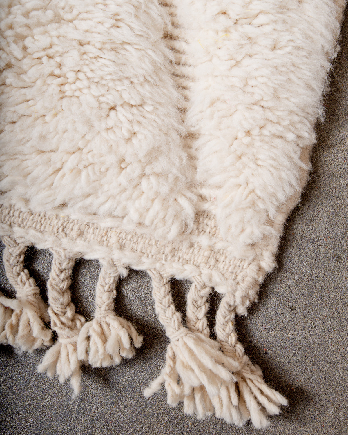 Modern, designer, handcrafted Berber rug from Morocco. Beniourain carpet with minimalist design, natural wool pile and a fluffy texture.