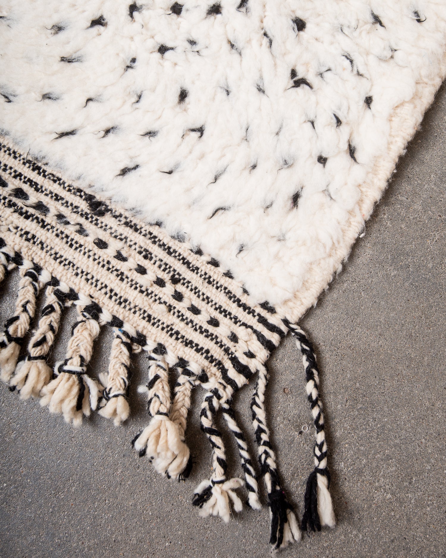 Modern, designer, handcrafted Berber rug from Morocco. Beniourain carpet with minimalist design, natural wool pile and a fluffy texture.