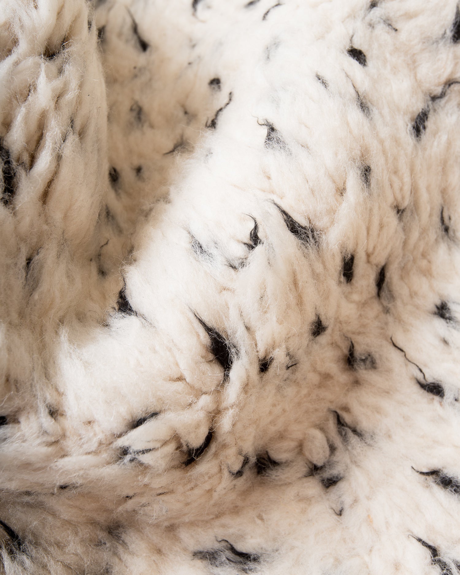 Modern, designer, handcrafted Berber rug from Morocco. Beniourain carpet with minimalist design, natural wool pile and a fluffy texture.