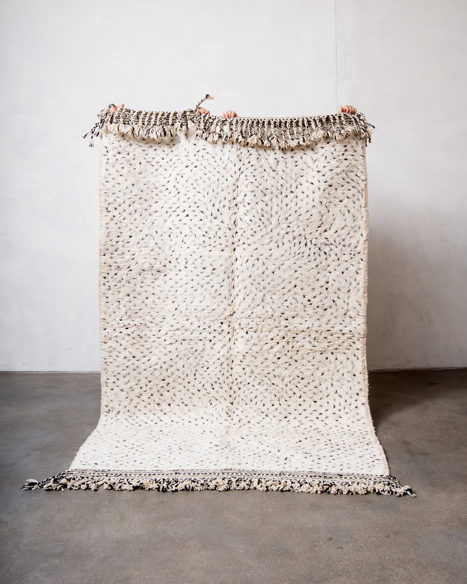 Modern, designer, handcrafted Berber rug from Morocco. Beniourain carpet with minimalist design, natural wool pile and a fluffy texture.