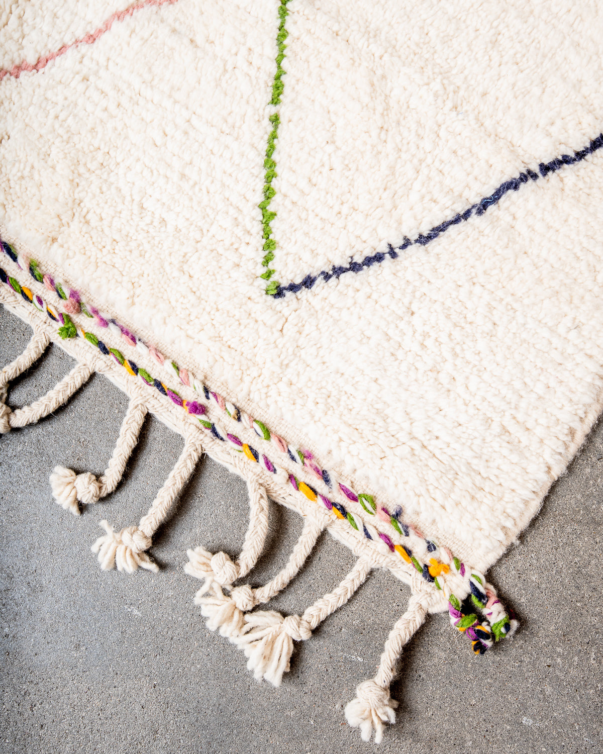 Modern, designer, handcrafted Berber rug from Morocco. Beniourain carpet with beautiful colours and patterns and fluffy wool texture.