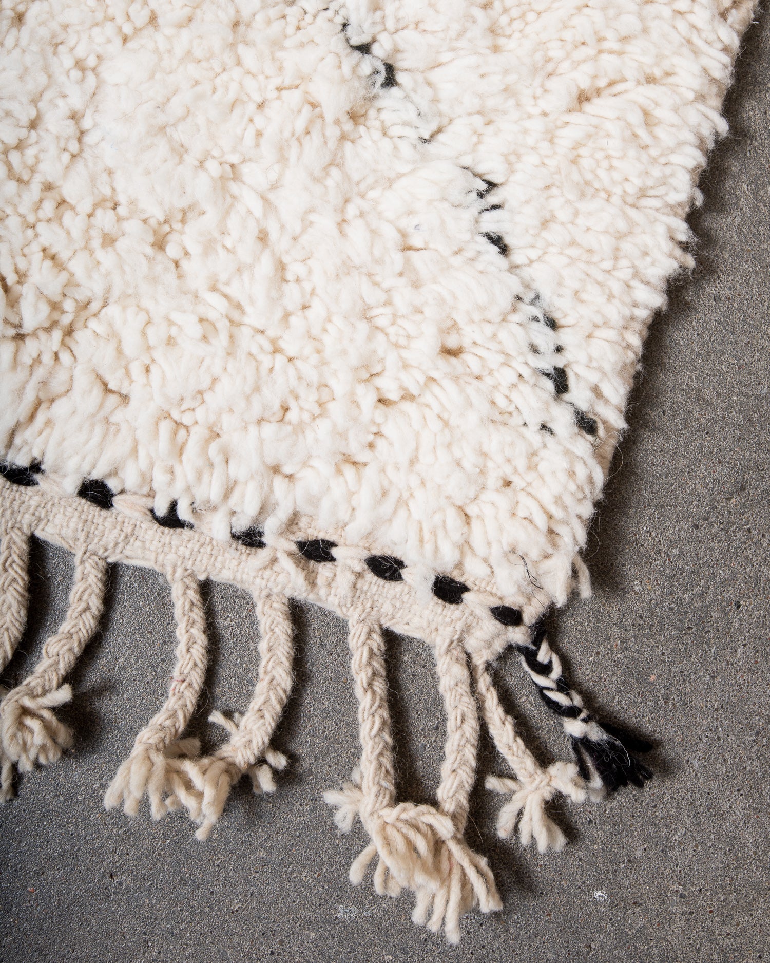 Modern, designer, handcrafted Berber rug from Morocco. Beniourain carpet with minimalist design, natural wool pile and a fluffy texture.