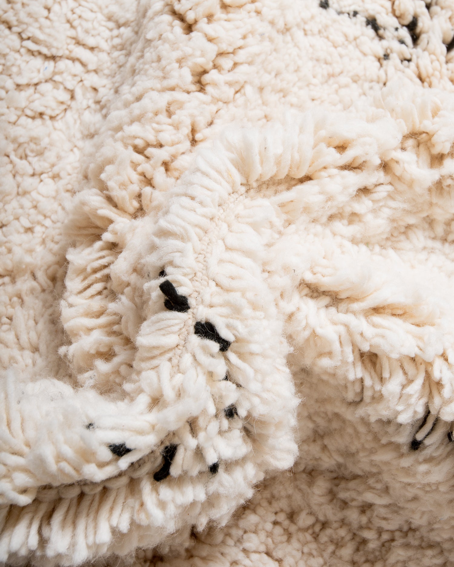 Modern, designer, handcrafted Berber rug from Morocco. Beniourain carpet with minimalist design, natural wool pile and a fluffy texture.