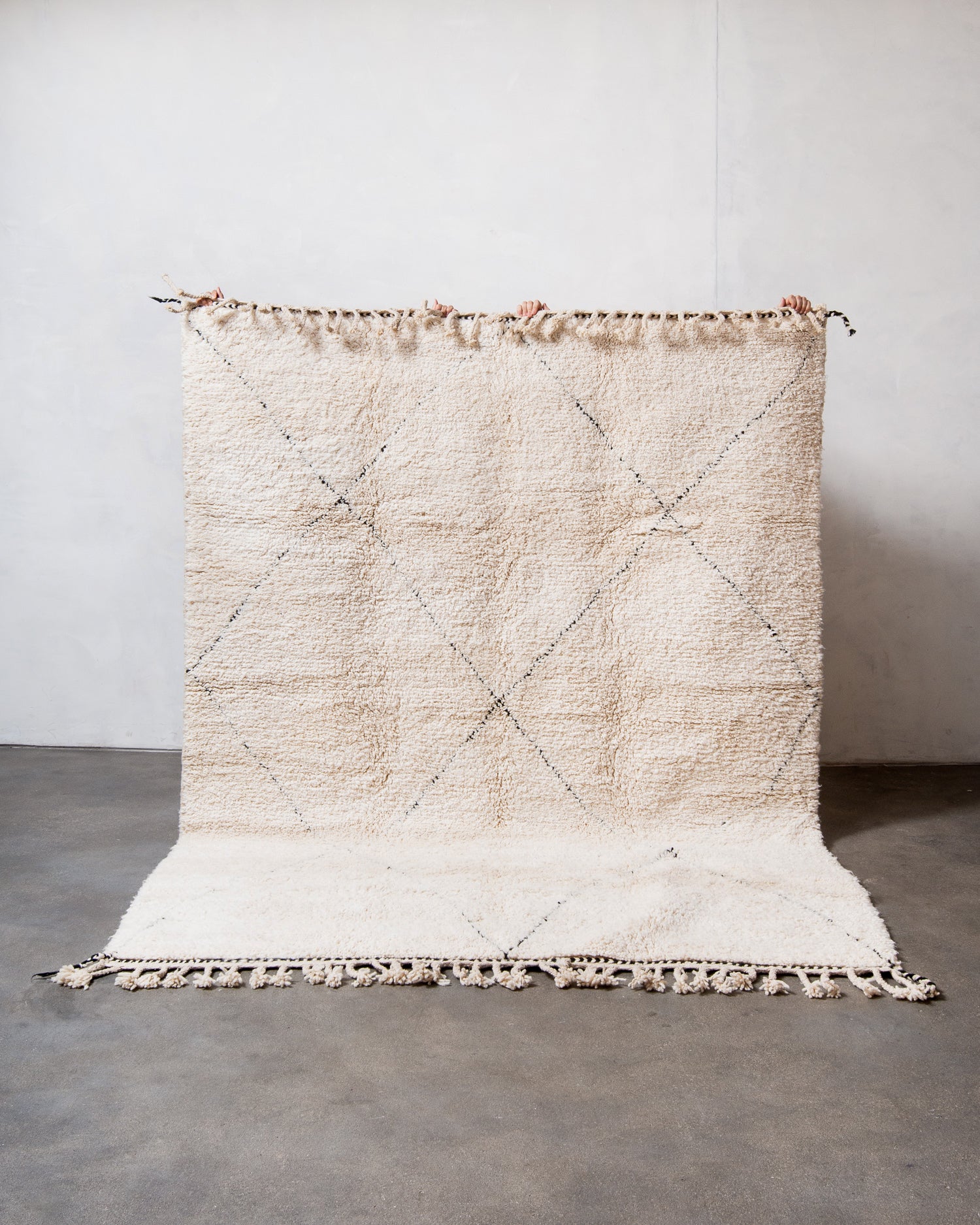 Modern, designer, handcrafted Berber rug from Morocco. Beniourain carpet with minimalist design, natural wool pile and a fluffy texture.