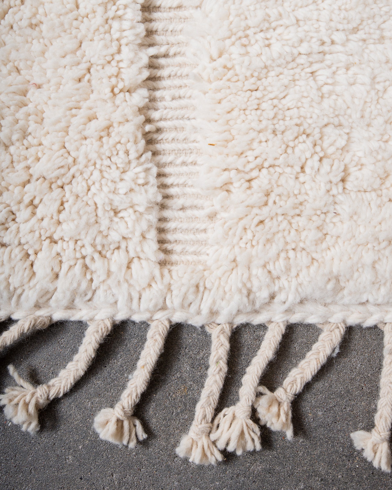 Modern, designer, handcrafted Berber rug from Morocco. Beniourain carpet with minimalist design, natural wool pile and a fluffy texture.