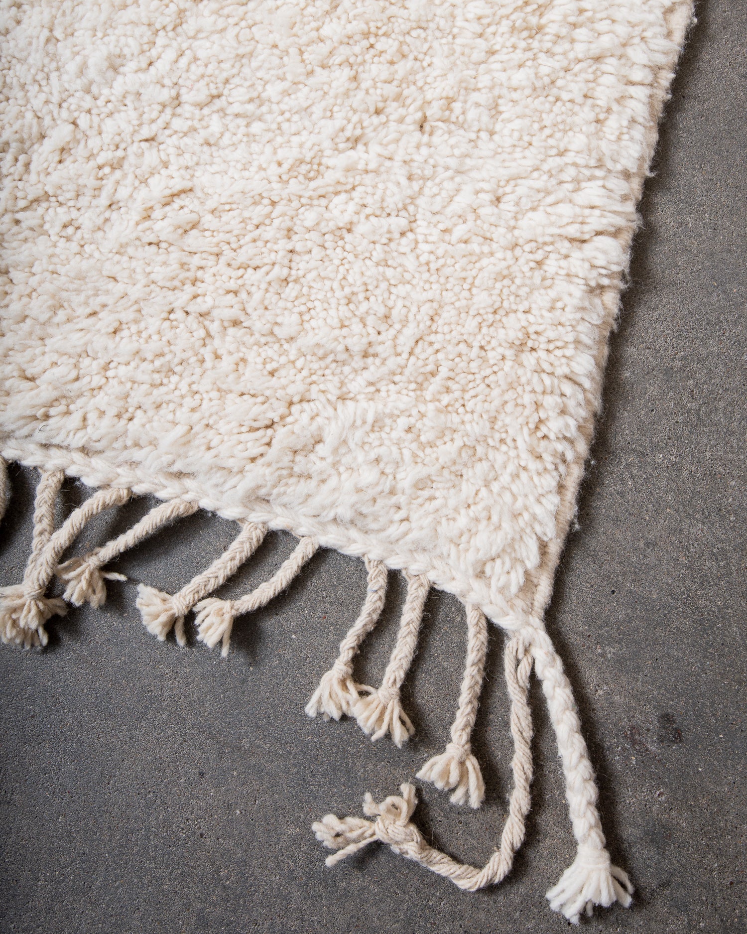 Modern, designer, handcrafted Berber rug from Morocco. Beniourain carpet with minimalist design, natural wool pile and a fluffy texture.