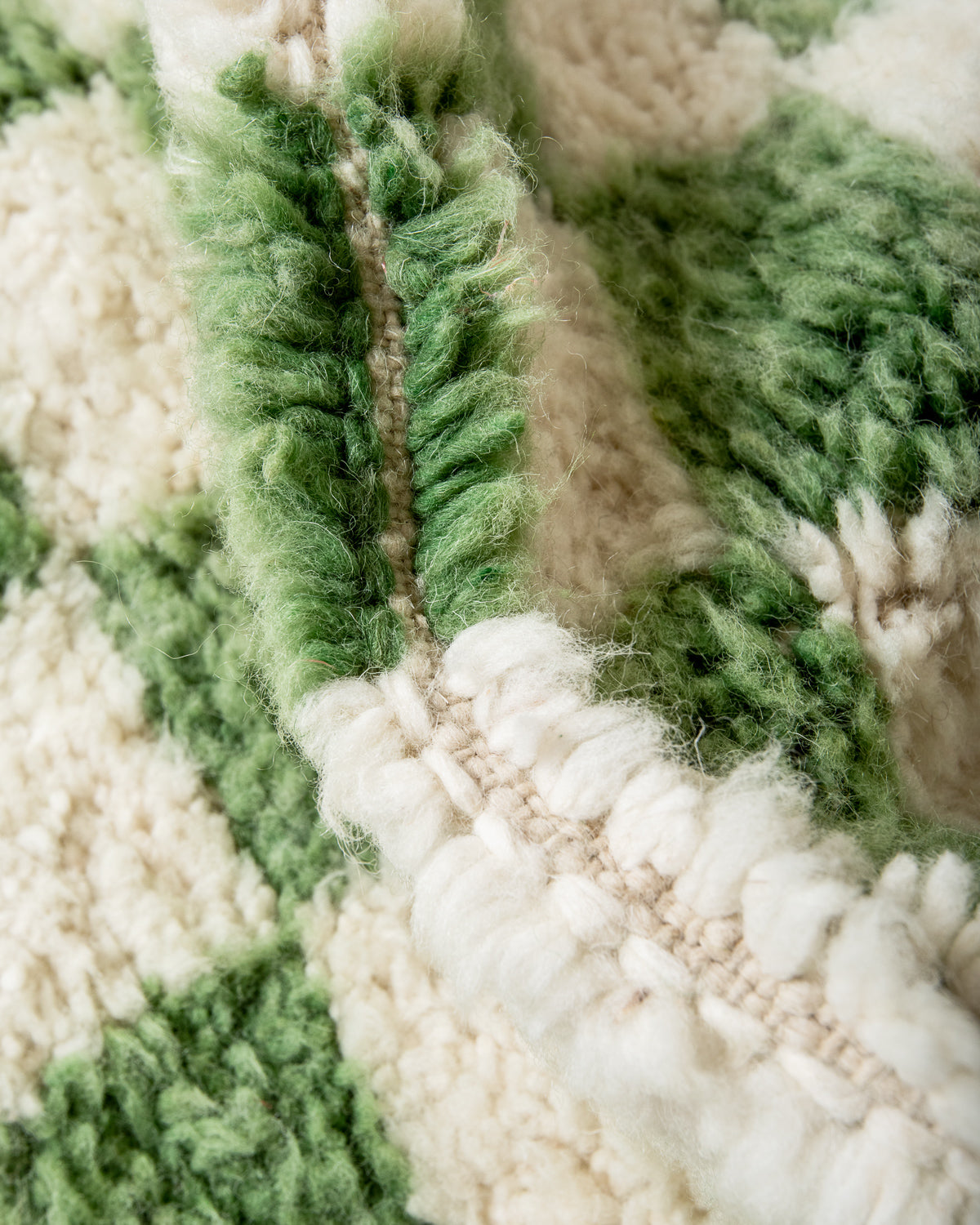 Modern, designer, handcrafted Berber rug from Morocco. Beniourain carpet with beautiful colours and patterns and fluffy wool texture.