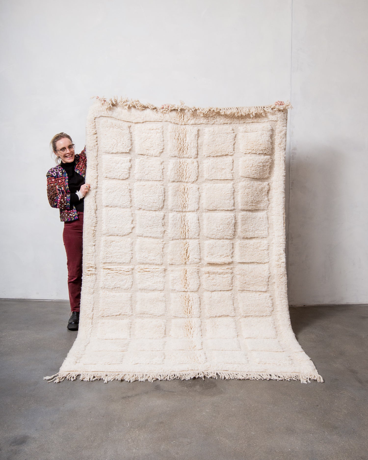 Modern, designer, handcrafted Berber rug from Morocco. Beniourain carpet with minimalist design, natural wool pile and a fluffy texture.