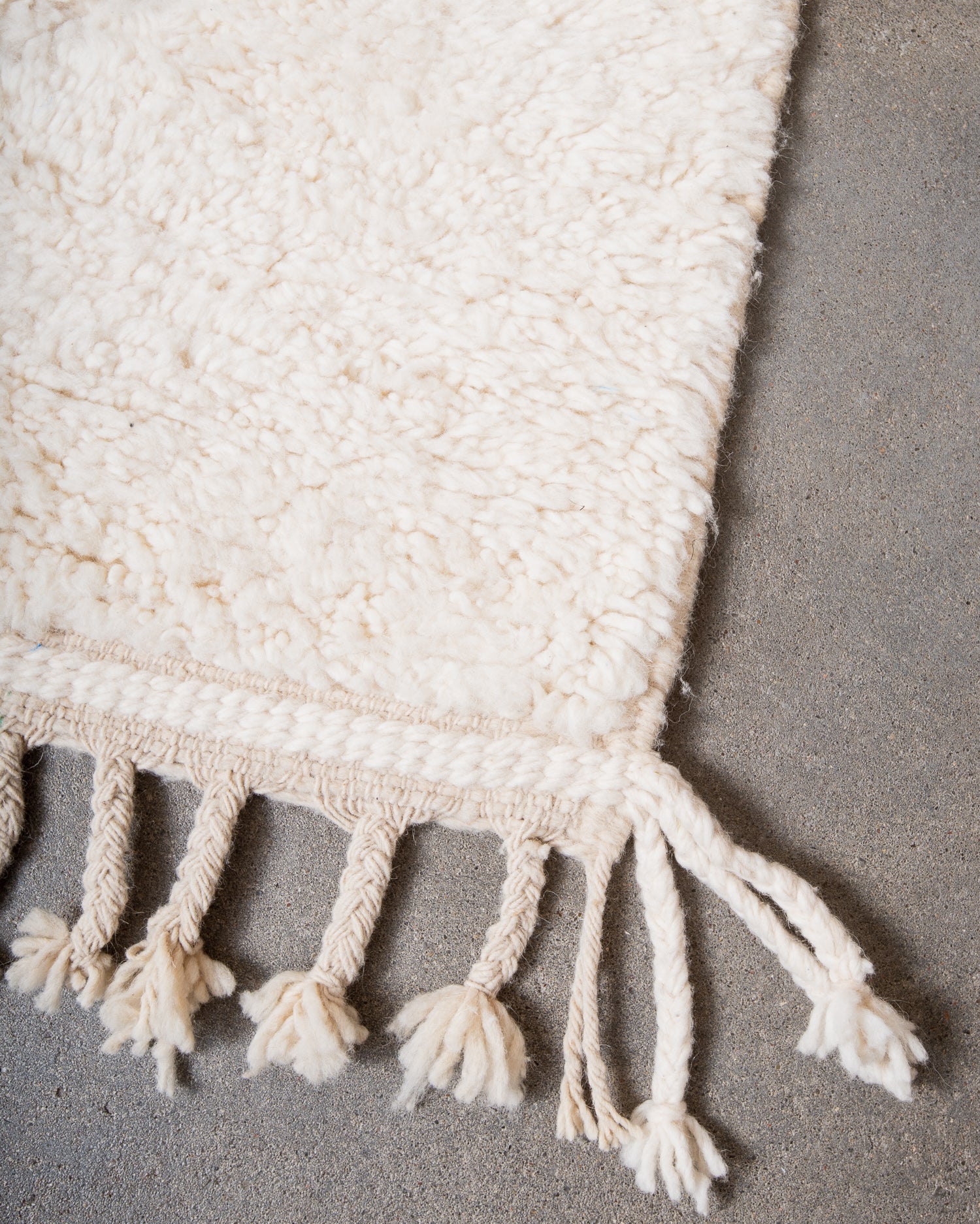 Modern, designer, handcrafted Berber rug from Morocco. Beniourain carpet with minimalist design, natural wool pile and a fluffy texture.