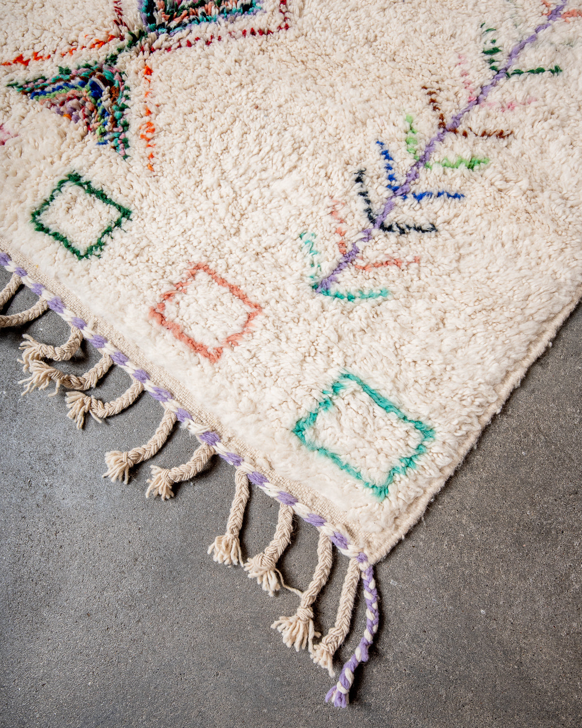 Modern, designer, handcrafted Berber rug from Morocco. Beniourain carpet with beautiful colours and patterns and fluffy wool texture.