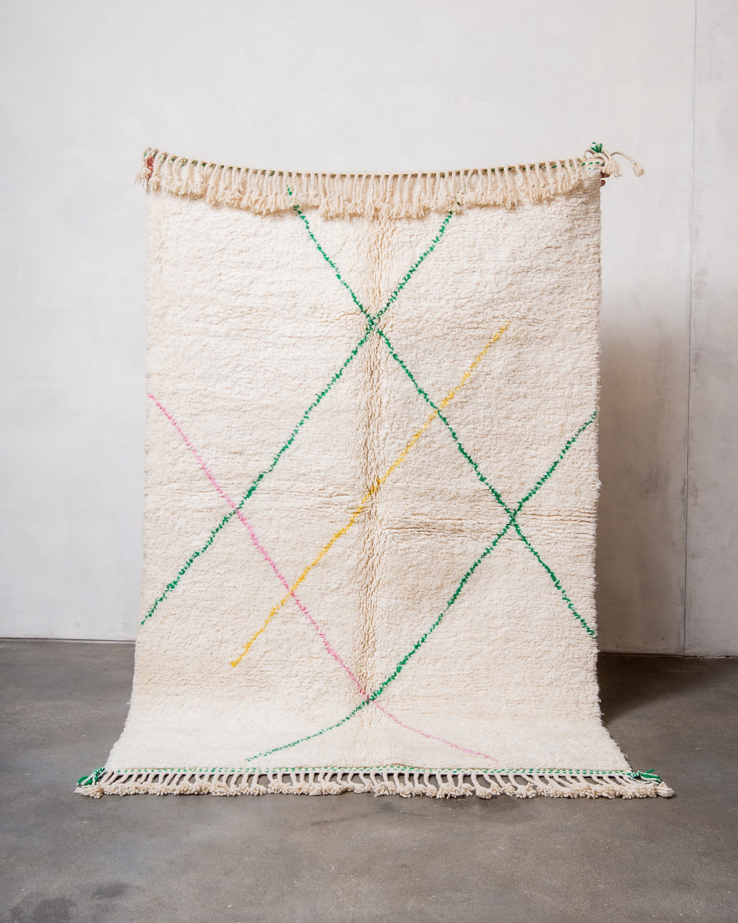 Modern, designer, handcrafted Berber rug from Morocco. Beniourain carpet with beautiful colours and patterns and fluffy wool texture. 