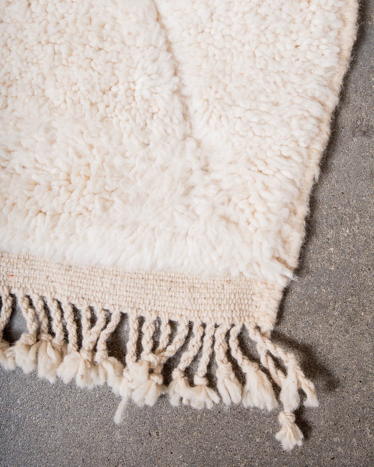 Modern, designer, handcrafted Berber rug from Morocco. Beniourain carpet with minimalist design, natural wool pile and a fluffy texture.