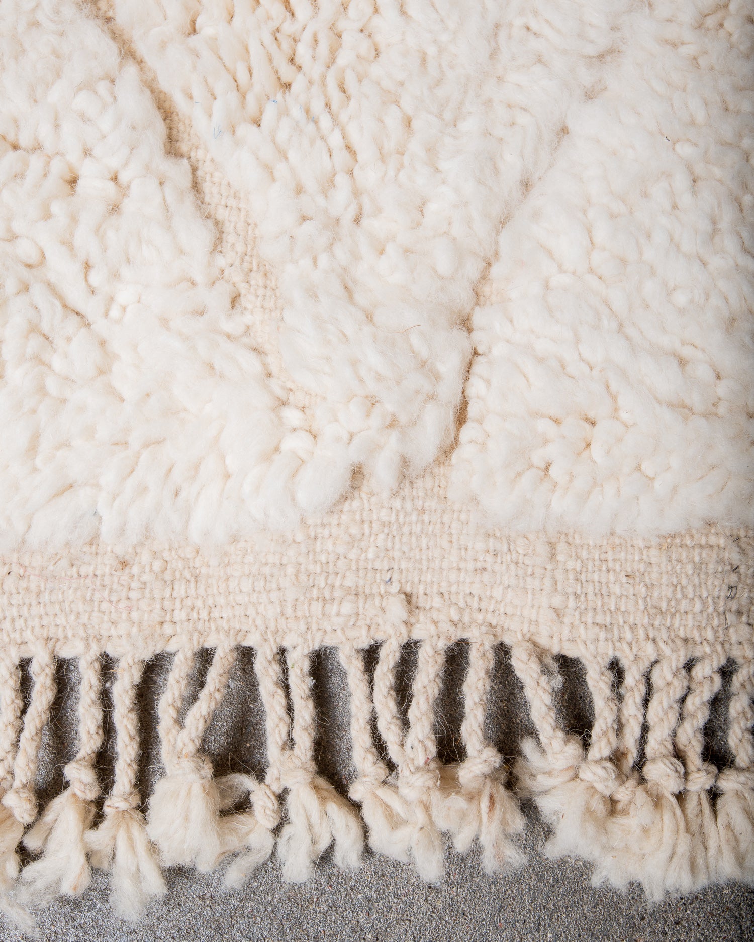 Modern, designer, handcrafted Berber rug from Morocco. Beniourain carpet with minimalist design, natural wool pile and a fluffy texture.