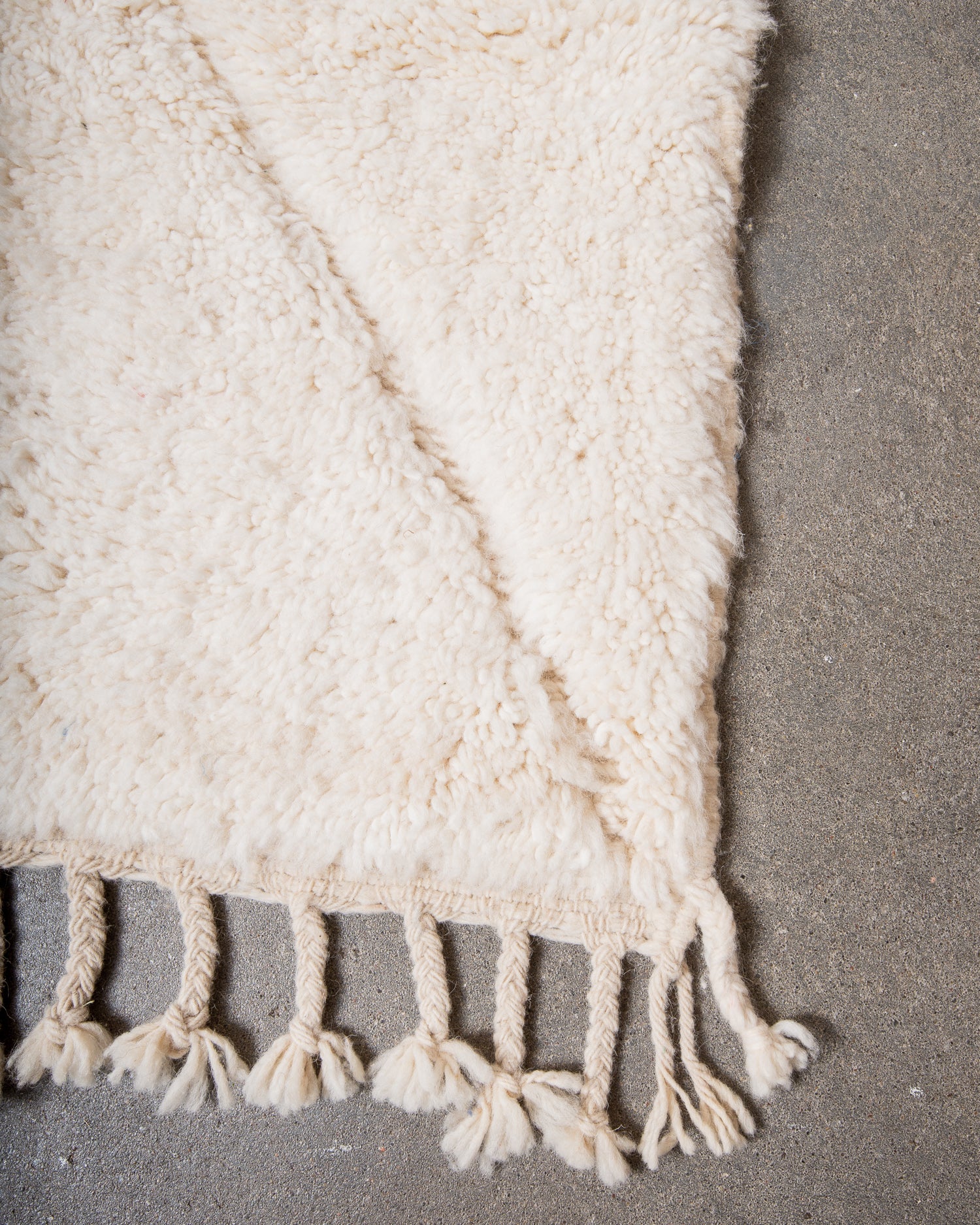 Modern, designer, handcrafted Berber rug from Morocco. Beniourain carpet with minimalist design, natural wool pile and a fluffy texture.