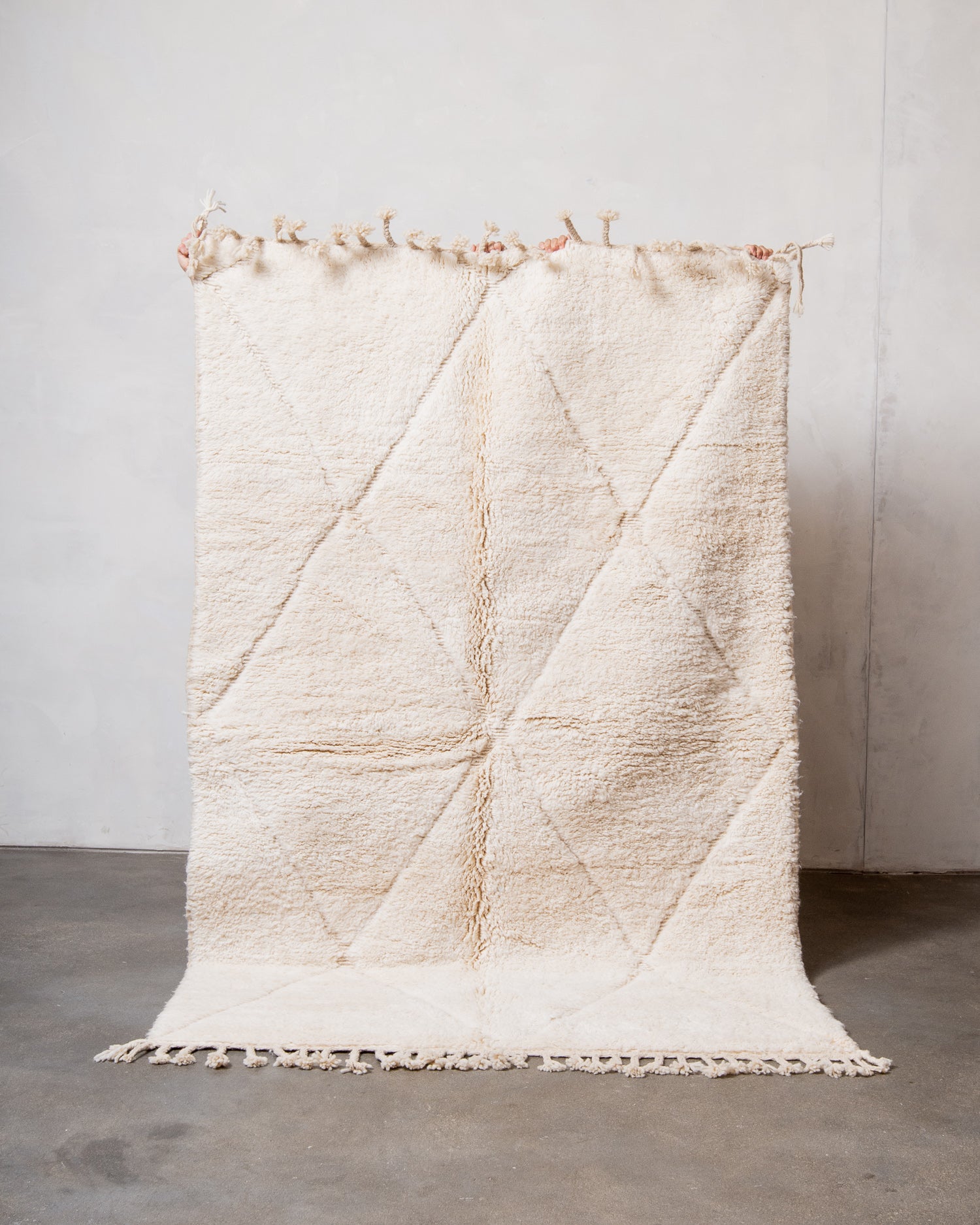 Modern, designer, handcrafted Berber rug from Morocco. Beniourain carpet with minimalist design, natural wool pile and a fluffy texture.