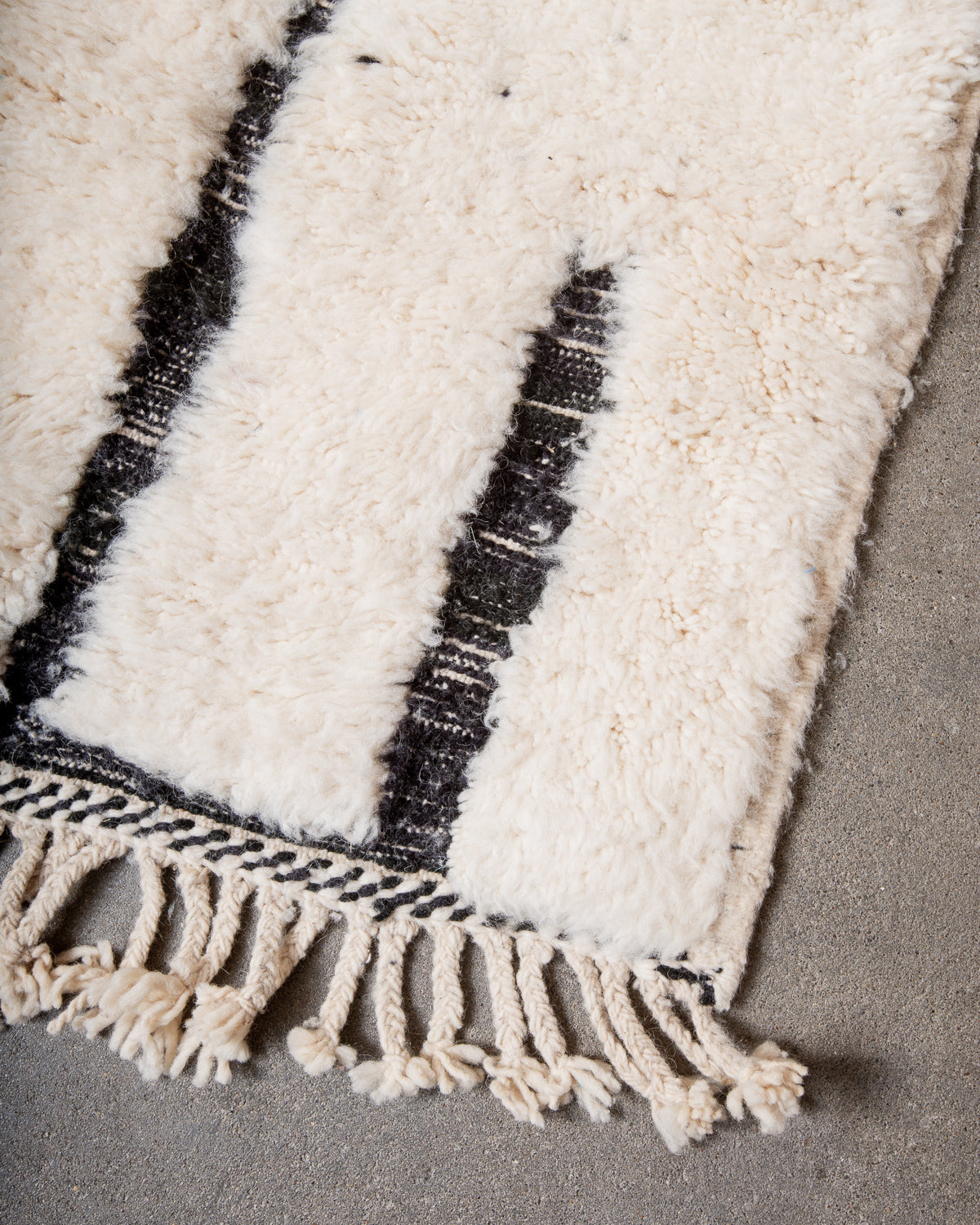 Modern, designer, handcrafted Berber rug from Morocco. Beniourain carpet with beautiful colours and patterns and fluffy wool texture.