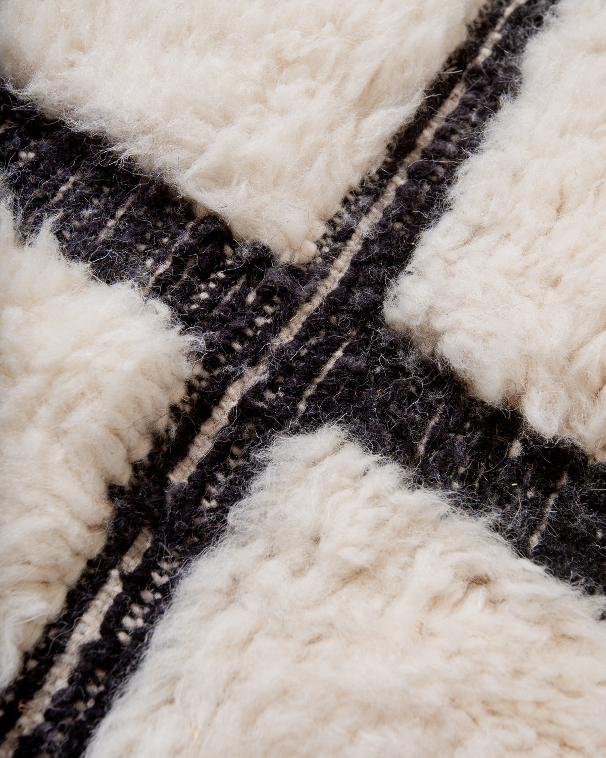 Modern, designer, handcrafted Berber rug from Morocco. Beniourain carpet with beautiful colours and patterns and fluffy wool texture.