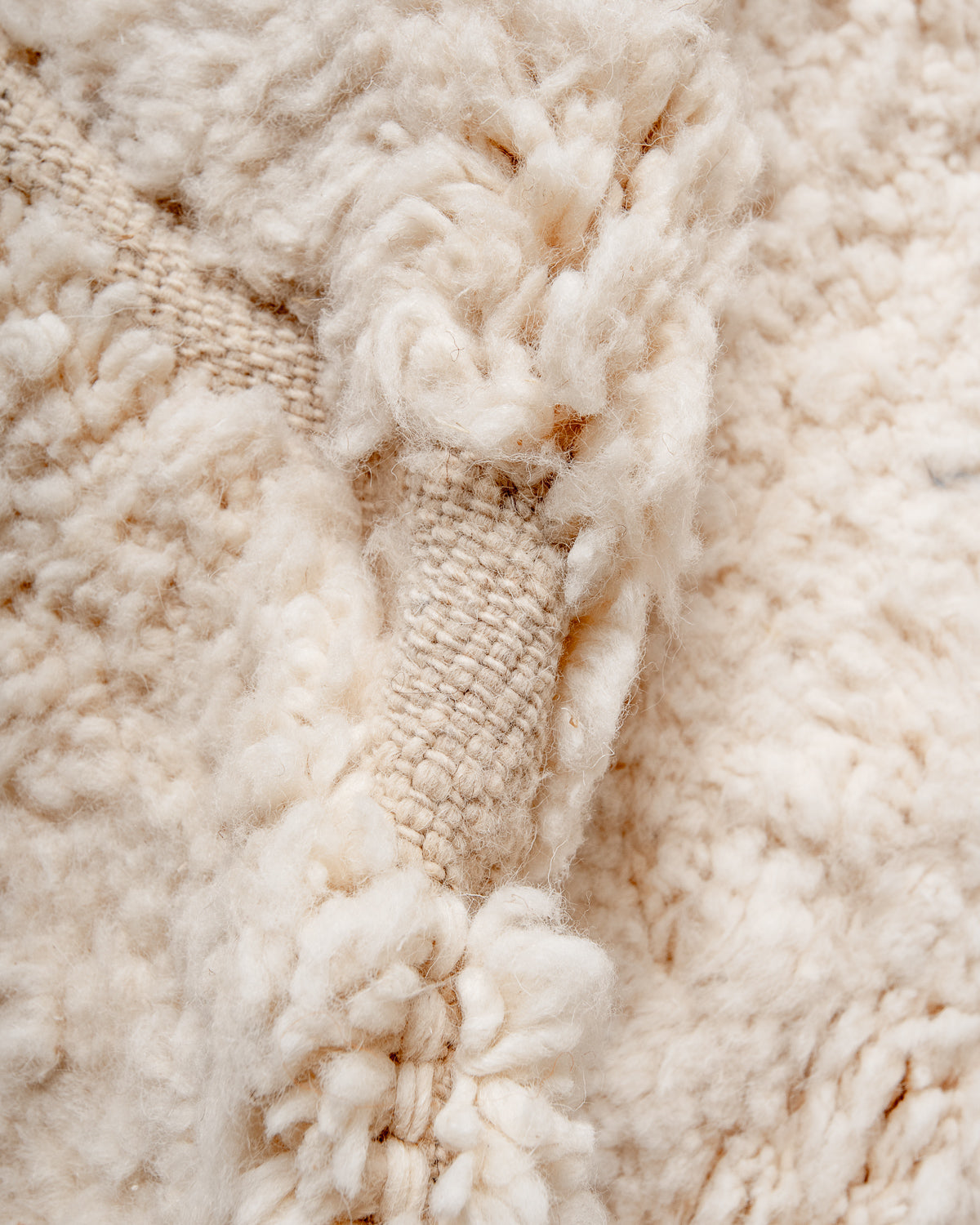 Modern, designer, handcrafted Berber rug from Morocco. Beniourain carpet with beautiful colours and patterns and fluffy wool texture. 