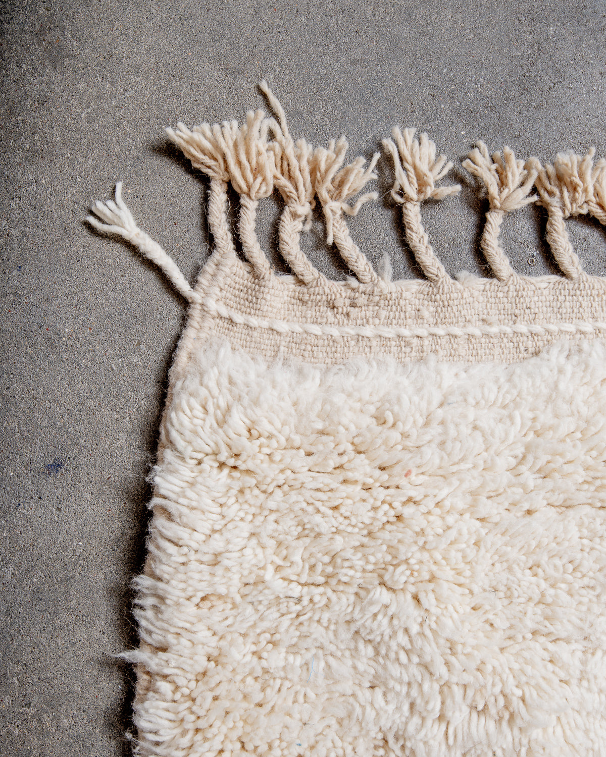 Modern, designer, handcrafted Berber rug from Morocco. Beniourain carpet with minimalist design, natural wool pile and a fluffy texture.