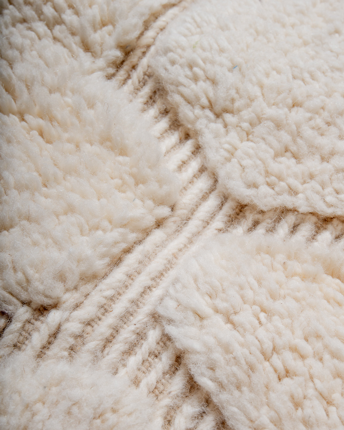 Modern, designer, handcrafted Berber rug from Morocco. Beniourain carpet with minimalist design, natural wool pile and a fluffy texture.