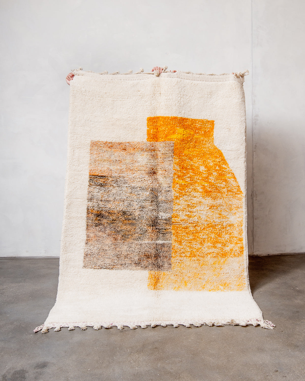 Modern, designer, handcrafted Berber rug from Morocco. Beniourain carpet with beautiful colours and patterns and fluffy wool texture.