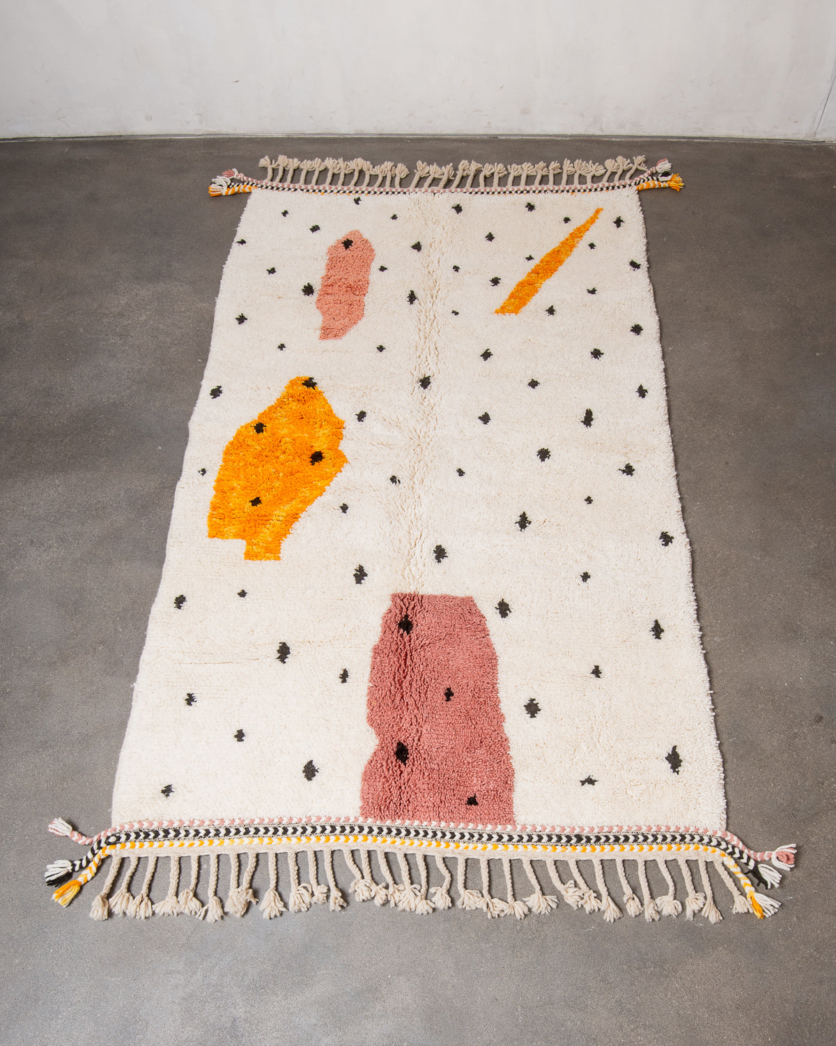 Modern, designer, handcrafted Berber rug from Morocco. Beniourain carpet with beautiful colours and patterns and fluffy wool texture.