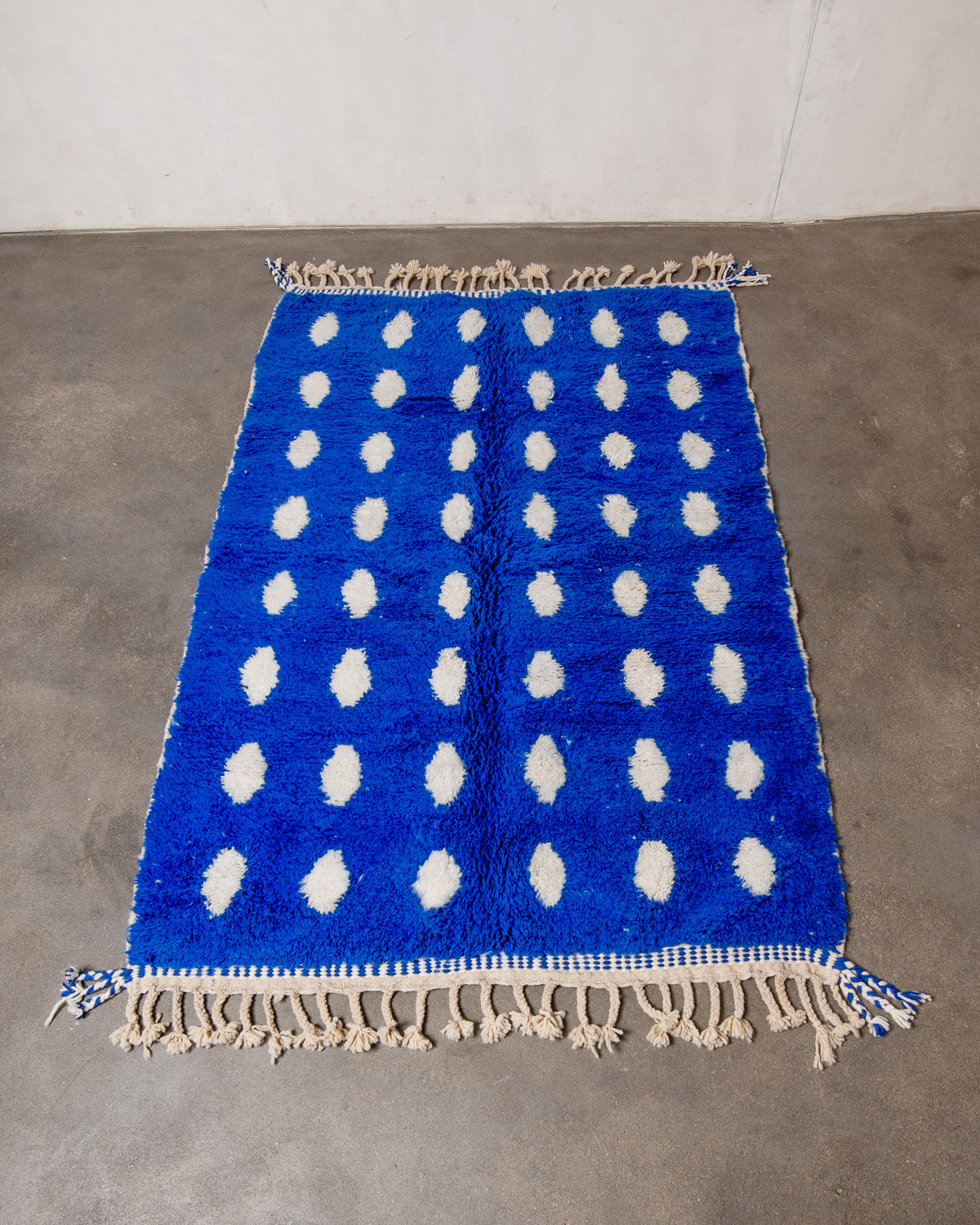 Modern, designer, handcrafted Berber rug from Morocco. Beniourain carpet with beautiful colours and patterns and fluffy wool texture.