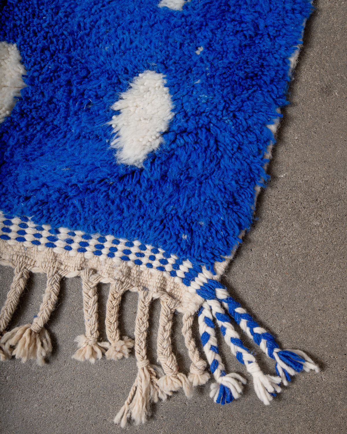 Modern, designer, handcrafted Berber rug from Morocco. Beniourain carpet with beautiful colours and patterns and fluffy wool texture.