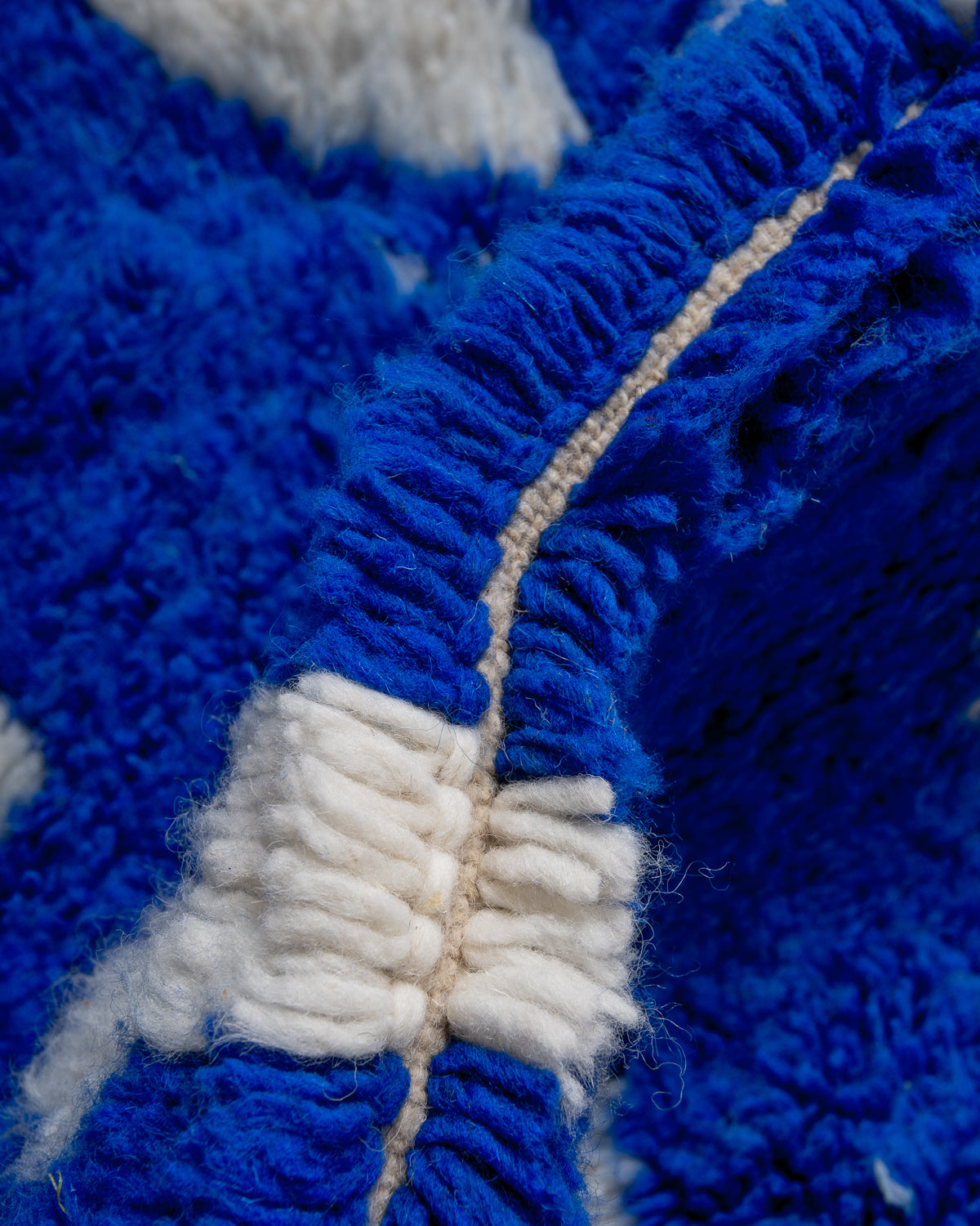 Modern, designer, handcrafted Berber rug from Morocco. Beniourain carpet with beautiful colours and patterns and fluffy wool texture.