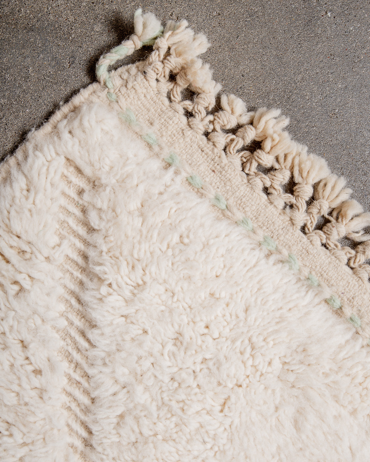 Modern, designer, handcrafted Berber rug from Morocco. Beniourain carpet with minimalist design, natural wool pile and a fluffy texture.