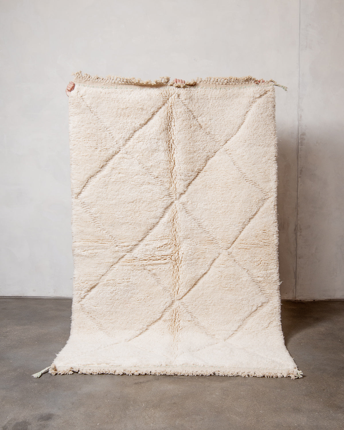 Modern, designer, handcrafted Berber rug from Morocco. Beniourain carpet with minimalist design, natural wool pile and a fluffy texture.