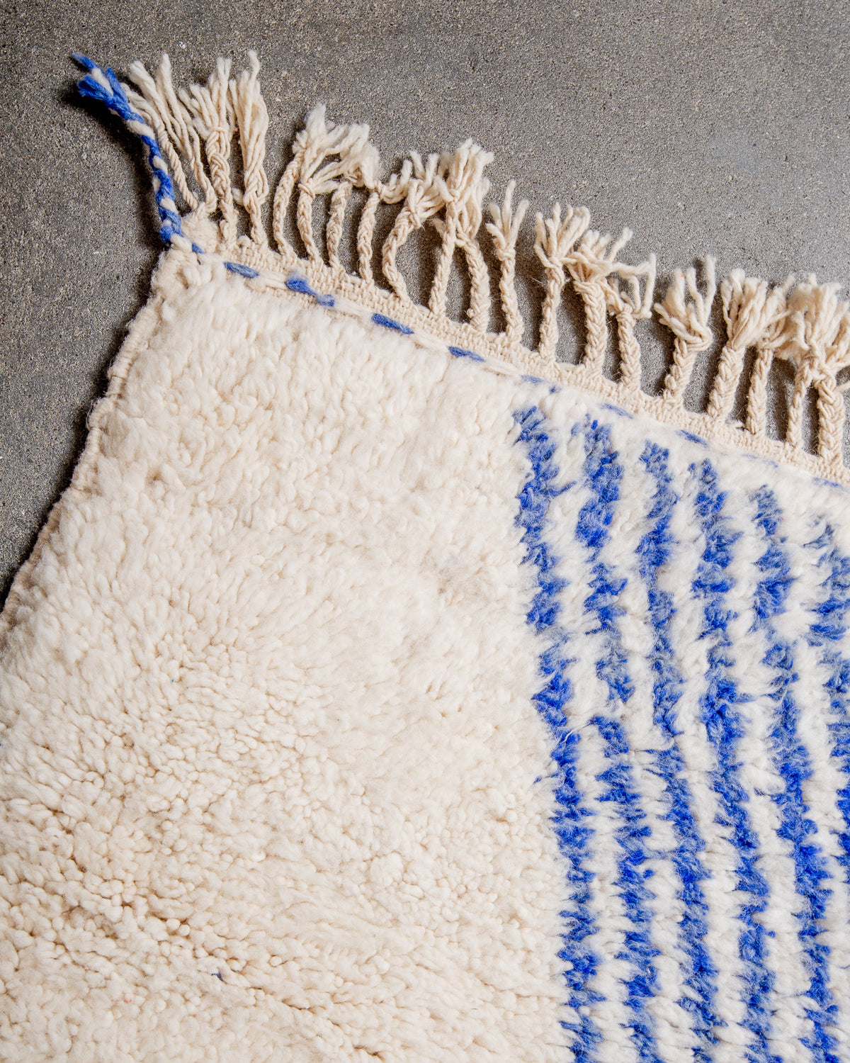 Modern, designer, handcrafted Berber rug from Morocco. Beniourain carpet with beautiful colours and patterns and fluffy wool texture.