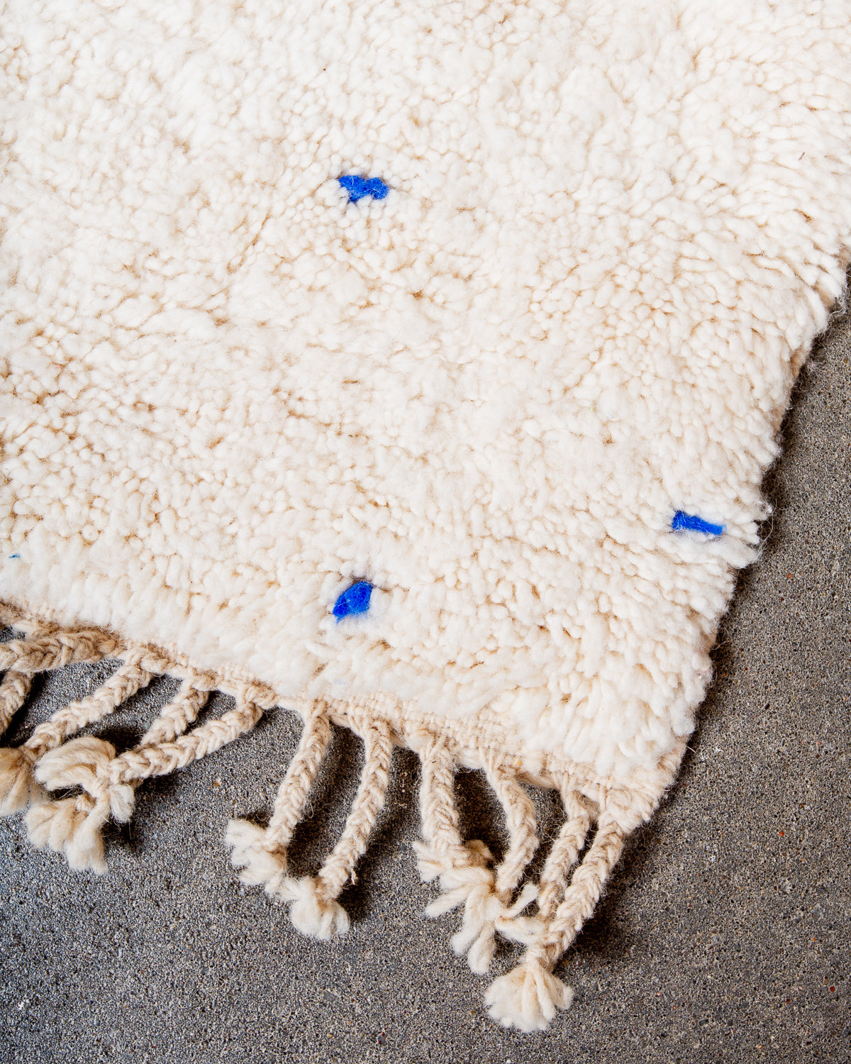 Modern, designer, handcrafted Berber rug from Morocco. Beniourain carpet with beautiful colours and patterns and fluffy wool texture.