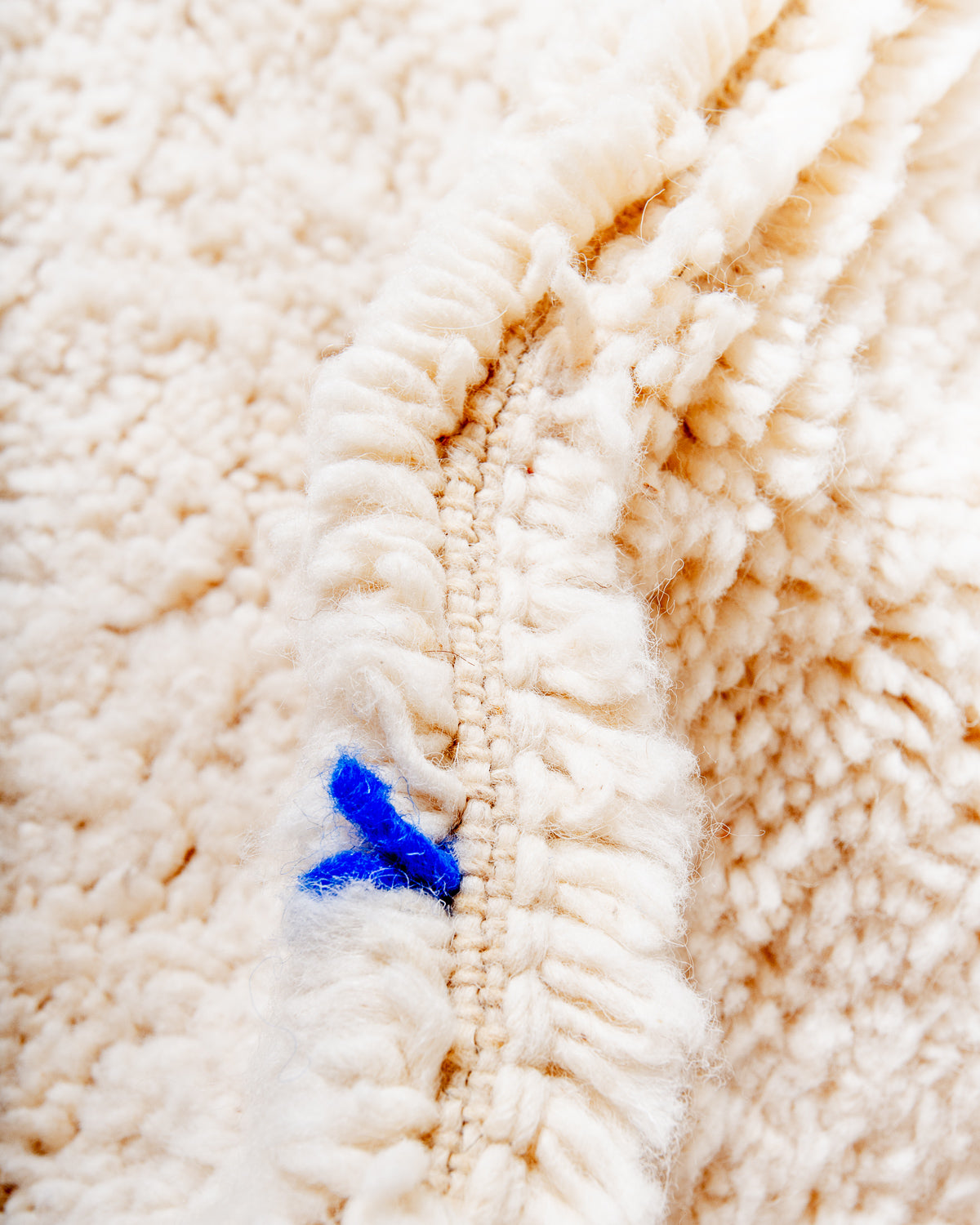 Modern, designer, handcrafted Berber rug from Morocco. Beniourain carpet with beautiful colours and patterns and fluffy wool texture.