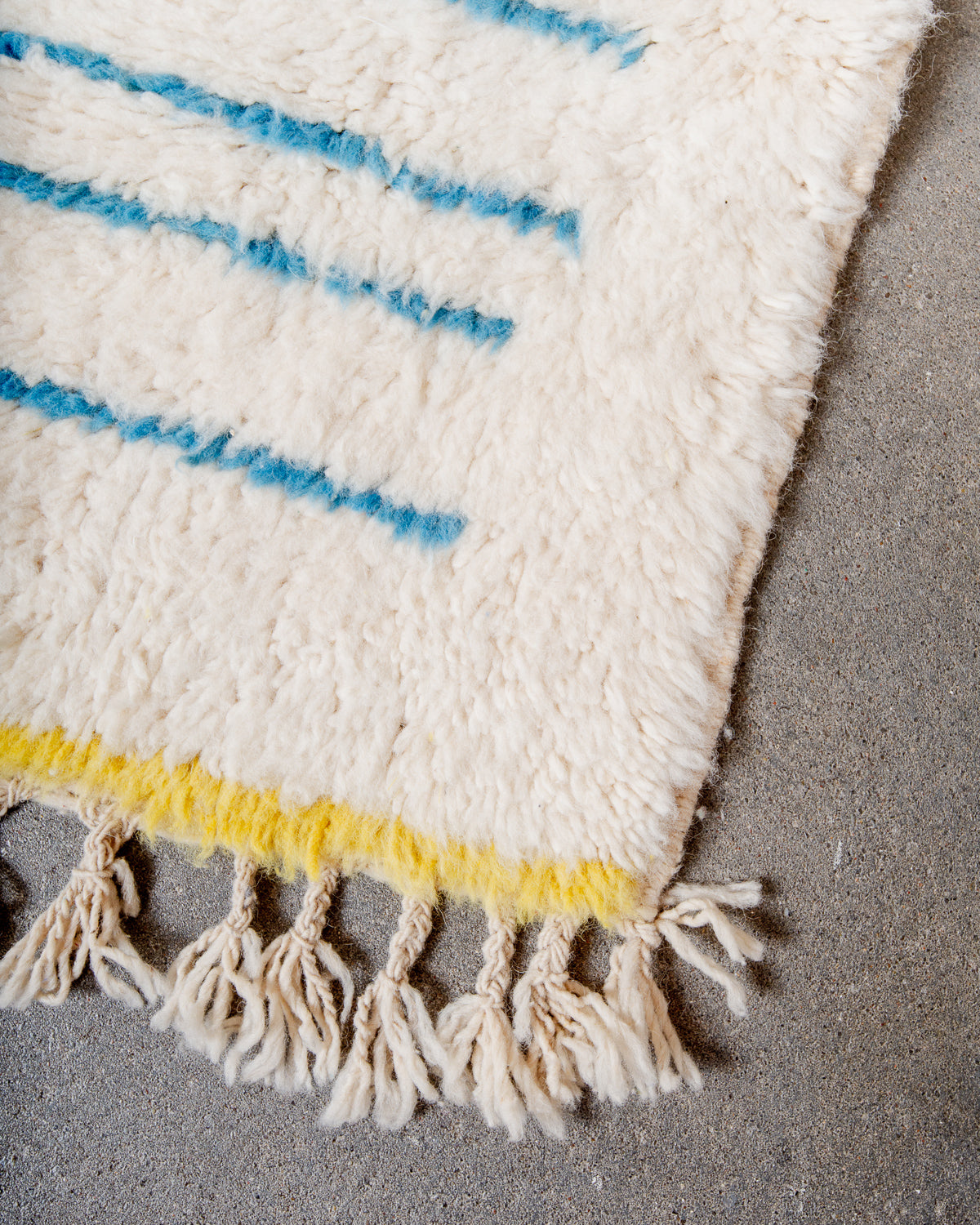 Modern, designer, handcrafted Berber rug from Morocco. Beniourain carpet with beautiful colours and patterns and fluffy wool texture.