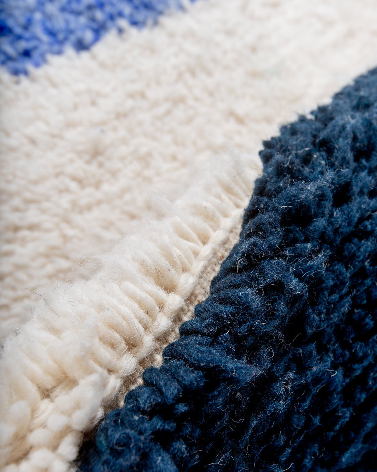 Modern, designer, handcrafted Berber rug from Morocco. Beniourain carpet with beautiful colours and patterns and fluffy wool texture.