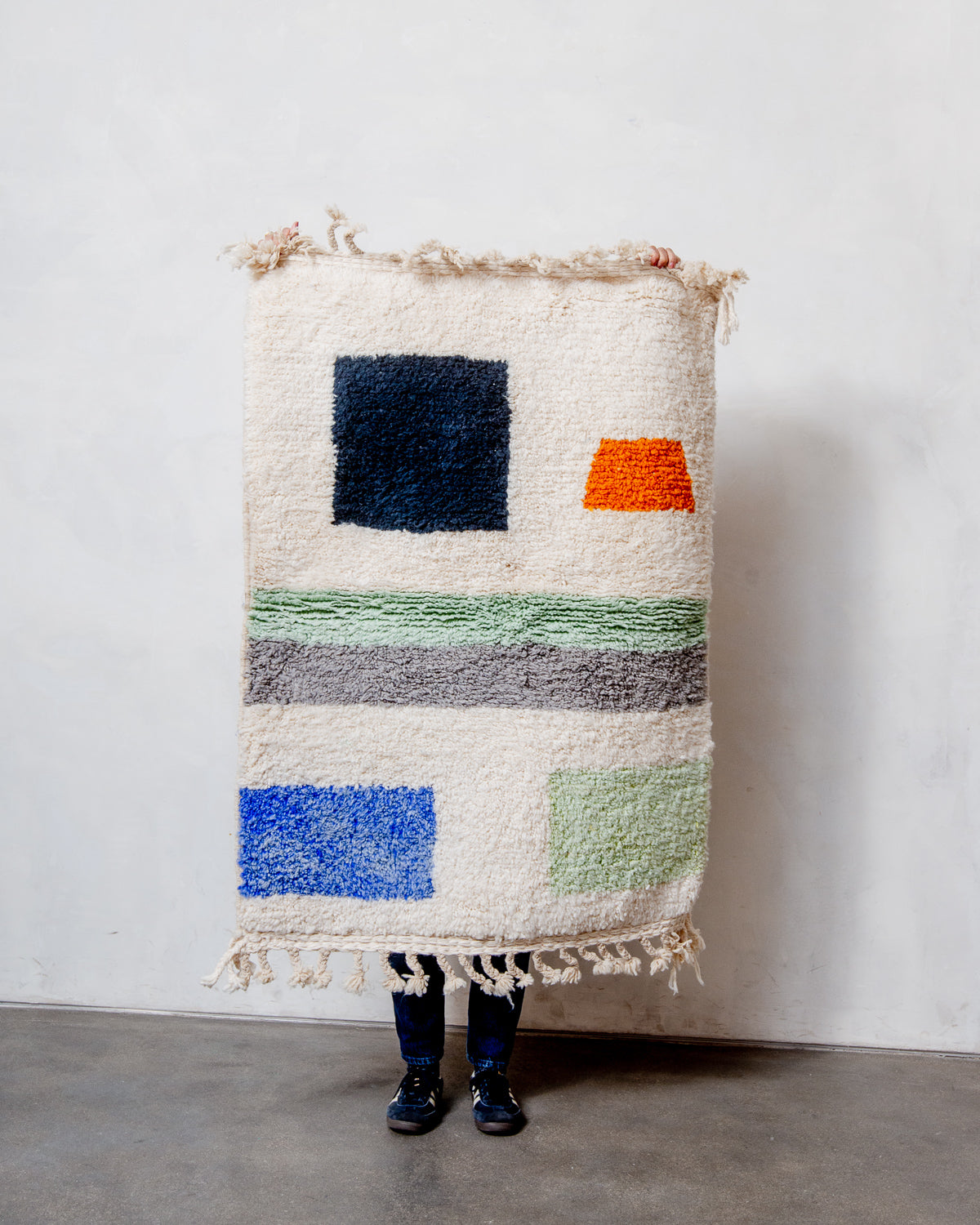 Modern, designer, handcrafted Berber rug from Morocco. Beniourain carpet with beautiful colours and patterns and fluffy wool texture.