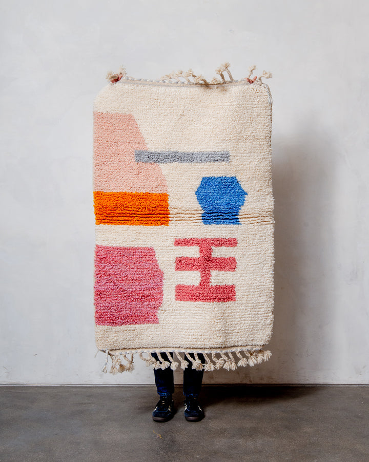 Modern, designer, handcrafted Berber rug from Morocco. Beniourain carpet with beautiful colours and patterns and fluffy wool texture.