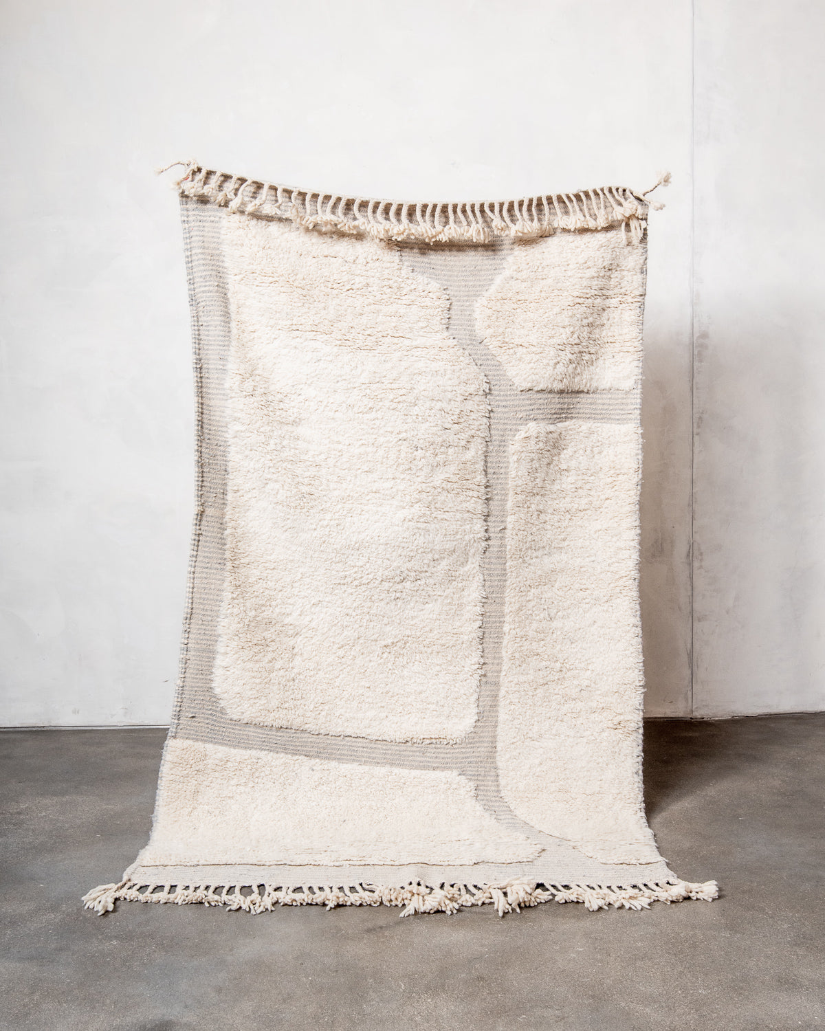 Modern, designer, handcrafted Berber rug from Morocco. Beniourain carpet with beautiful colours and patterns and fluffy wool texture. 